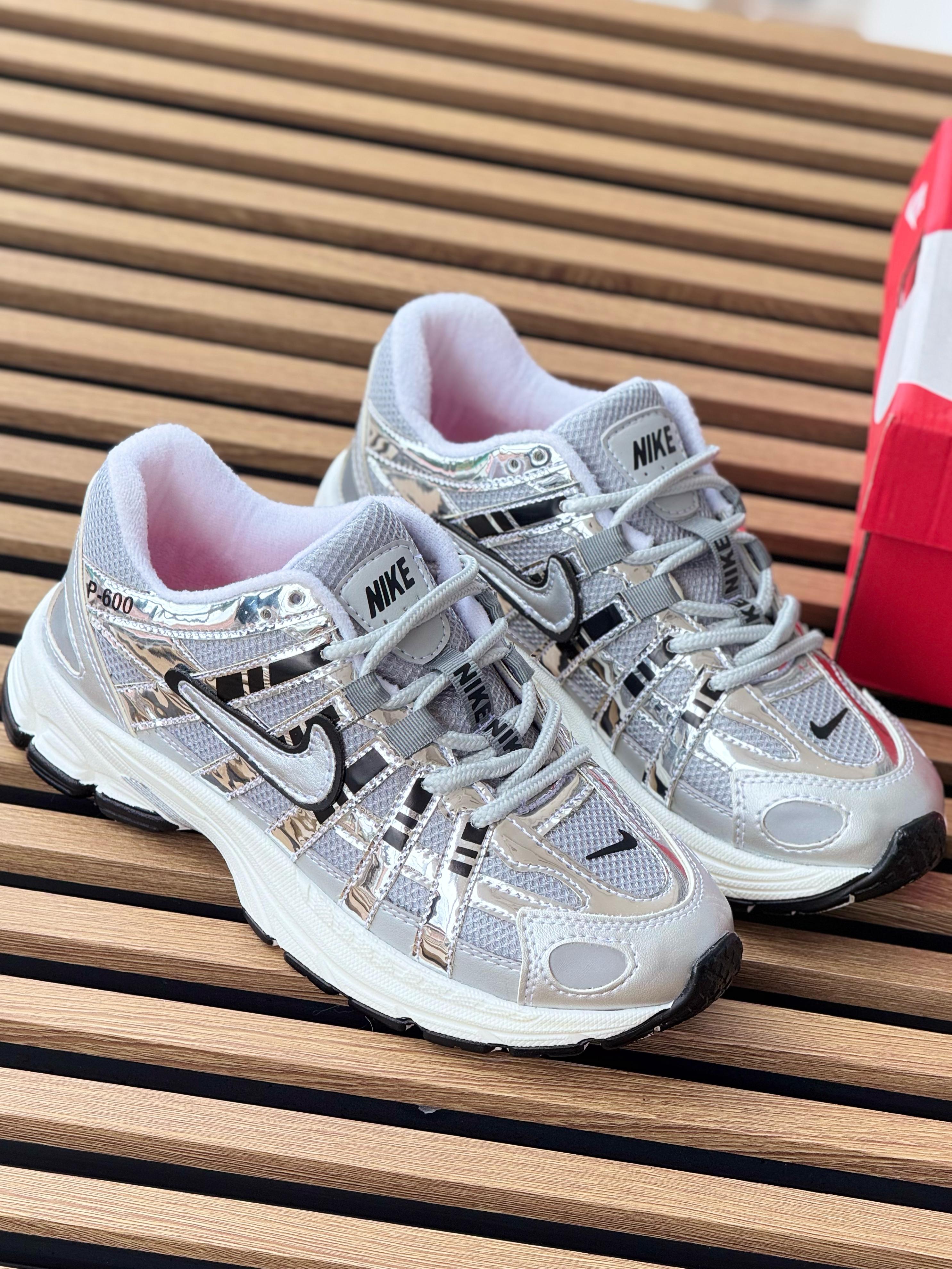 NIKE P600 GRIS