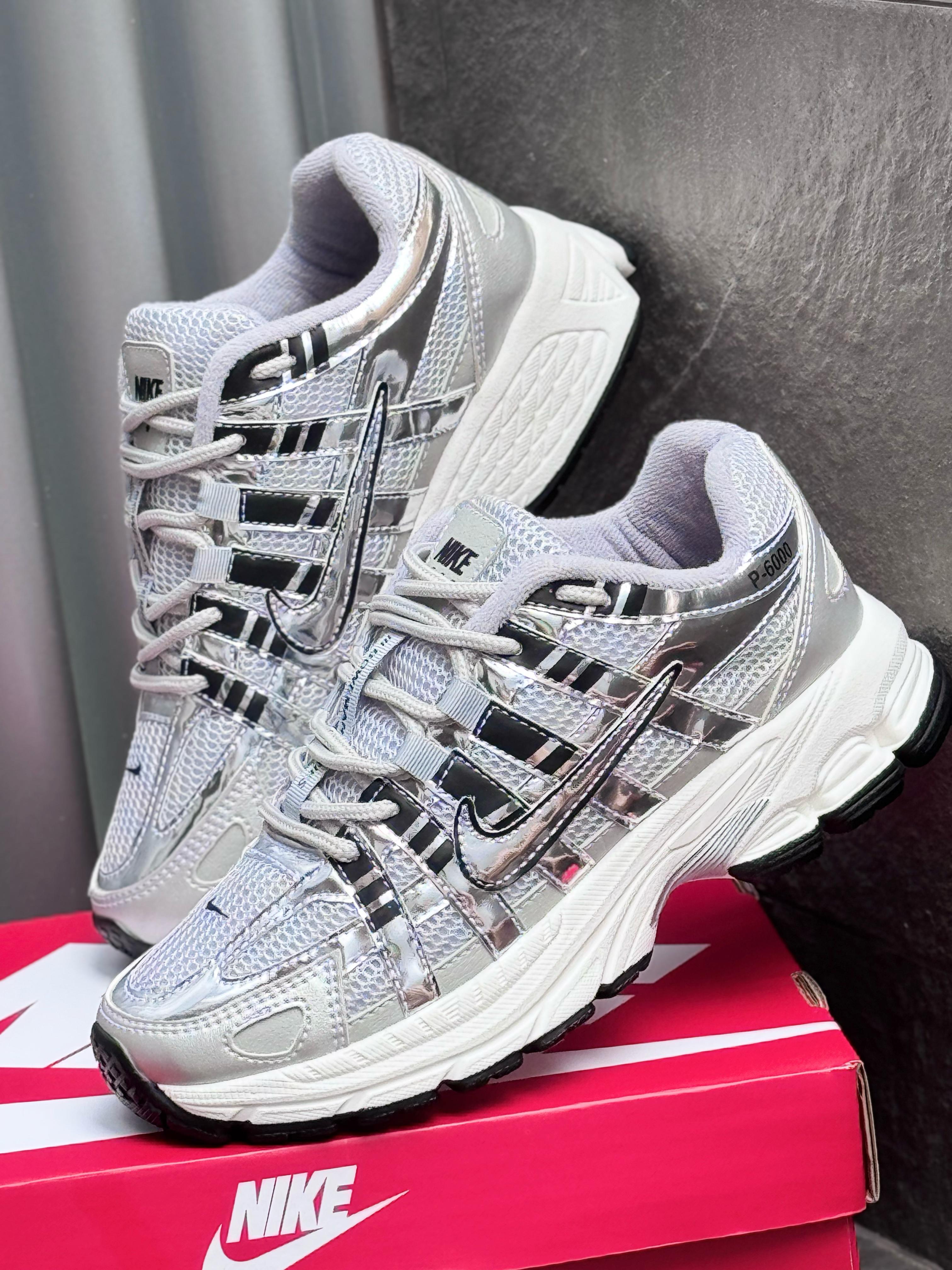 NIKE 9 6000 GRIS X PLATEADO